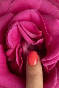 In regenerative and aesthetic gynaecology, technology can do so much… - top view woman touching pink flower